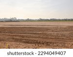 Small photo of Land, landscape at evening. Include soil backfill, empty or vacant area at outdoor. Real estate or property for small plot, development, housing subdivision, construction and investment in Chiang Mai.