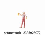 Miniature people, painter holding paint brush isolated on white background with clipping path