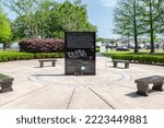 Small photo of NEW ORLEANS, LA, USA - APRIL 11, 2021: The New Orleans Katrina Memorial Corporation monument in Charity Hospital Cemetery