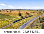 Aerial passenger Train in central west at Dubbo - close above the country landscape.
