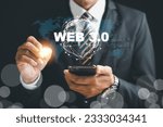 Small photo of Embracing the Web 3.0 revolution, a businessman contemplates mobile phone strategies to capitalize on the futuristic trends of metaverse, blockchain, and fintech. web3 concept