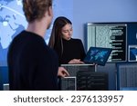 Small photo of Cyber security team working in a Cyber Security Operations Center SOC to protect systems and technologies