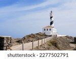 View of Favaritx lighthouse on Menorca island, Spain. Balearic Islands, Popular tourist attraction and travel destination in Europe
