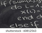 Small photo of a detail of computer code in Fortran explained with white chalk on blackboard