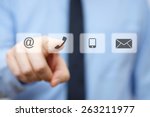businessman pressing phone button, company identification icons