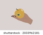 A Hand Holding A Yellow Apple...
