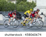 Small photo of PARIS-JUL 24: Chriss Froome wearing the Yellow Jersey, Greg Van Avermaet and Damiano Caruso passing by the Arch de Triomphe on Champs Elysees in Paris during the latest stage of Tour de France 2016.