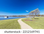 ST HELENS, TASMANIA - SEPTEMBER 20: View of the waterfront area of Beauty Bay from Percy Steel Reserve on a warm spring morning in St Helens, Tasmania, Australia on September 20th 2022
