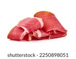 Small photo of Delicious jerked prosciutto crudo, isolated on white background. High resolution image