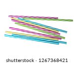 Small photo of Colourly striped plastic drinking straws, white underground background