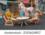 Small photo of Barbie and Ken dolls. The child plays doll date. Minsk, Belarus, august 28, 2023