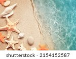 Sea sand with starfish and...