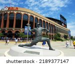 Small photo of Flushing, NY - August 10, 2022. The entrance to Citi Field through the Jackie Robinson rotunda. The newly erected sttue of Tom Seaver is in the foreground.
