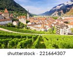 Beautiful view at Swiss town Chur , vineyards and Alps mountains, summertime