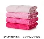 Soft pink towels on white background
