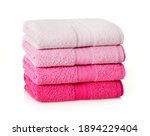 Pink towels stack on white background