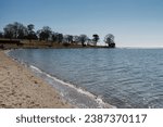 Small photo of Sasco Beach in Fairfield connecticut on a sunny cloudless winter day.