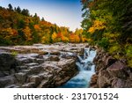 Autumn Color And Waterfall At...