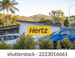 Small photo of AIRLIE BEACH, AUSTRALIA - AUGUST 21, 2018: Hertz rental car station along the city coast