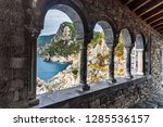 View through columns of Church of St. Peter in Portovenere or Porto Venere town on Ligurian coast. Province of La Spezia. Italy