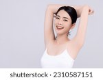Small photo of Beautiful Young Asian woman lifting hands up to show off clean and hygienic armpits and underarms isolated, Smooth armpit concept.