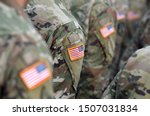 American soldiers and flag of...