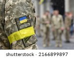 Armed Forces of Ukraine. Ukrainian soldier. Ukrainian army. Ukrainian flag on military uniform. 