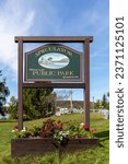 Small photo of Speculator, NY USA - September 27, 2023: Welcome to Speculator NY sign in the Adirondacks on an early fall sunny afternoon