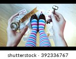 Alice in wonderland. Background. Key and potion in hands against a floor