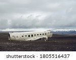 Crashed military plane in black sand Solheimasandur beach.
The US Navy DC-3 super bus airplane crash landed in Iceland. Solheimasandur beach, close to town Vik.