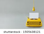 Retro Typewriter With Yellow...
