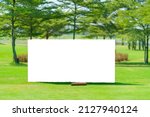 Small photo of Mockup image of Blank billboard white screen posters billboard for advertising Sponsor in Golf course activity.
