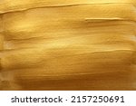 Small photo of Gold (bronze) color smear brushstroke stain blot horizontal background. Abstract Painting texture.