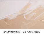 Small photo of Art Acrylic smear blot brushstroke painting wall. Abstract texture beige, white color stain horizontal copy space canvas background.