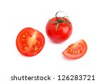 Tomato and slices of tomato on white background