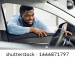 Car Buyer. Black Guy Looking At ...