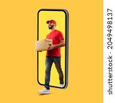 Small photo of Arab Courier Guy Coming Out Of Big Phone Screen Carrying Parcel Box Delivering Package Over Yellow Studio Background. Delivery Service, Mobile App For Your Smartphone. Square Shot