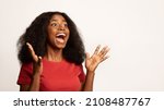 Small photo of Big Surprise Concept. Overjoyed Black Woman Raising Hands And Exclaiming With Excitement, Happy African American Female Emotionally Reacting To Good News Or Offer, Isolated On White Background