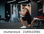 Small photo of Portrait Of Athletic Black Man Making Bulgarian Split Squat Exercise At Gym, Motivated Young African American Male Training On Leg Muscles At Modern Sport Club, Enjoying Bodybuilding, Side View