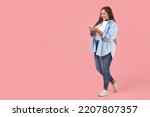 African American Plus Size Female Using Smartphone Texting Standing Posing On Pink Background, Studio Shot. Great Mobile App Concept. Full Length, Copy Space