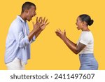 Black man and woman engage in playful gestures with exaggerated surprised expressions, creating humorous and lively scene on vivid yellow background