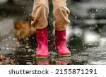 Kid Wearing Rubber Boots...