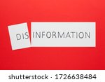 Changing the word disinformation to information on a white sheet