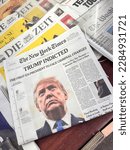 Small photo of New York City, New York - April 4, 2023: Headlines of newspapers in New York report on the previous days announcement of former President Donald Trump being indicted