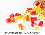 Gummies on an isolated background in a glass container