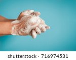 Closeup of person washing hands isolated. Cleanliness and body care concept.  
