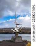 Small photo of Akureyri, Iceland - 16 October 2021: Sigling, meaning sailing or voyage, statue, by Jon Gunner Arnason, Akureyri, Northern Iceland. Sister to the famous Sun Voyager sculpture in Reykjavik