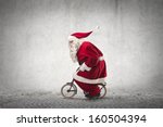Santa Claus Rides A Bicycle