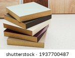 Laminate background. Samples of MDF for flooring and interior design. Production of furniture.