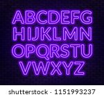 neon purple alphabet on brick... | Shutterstock .eps vector #1151993237